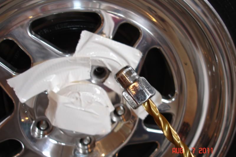 Removing a seized or cross threaded lug nut.